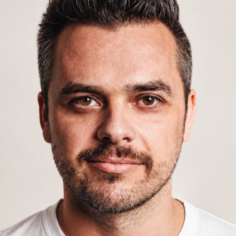 Georg, the Founder of Fifty Five in a close-up portrait