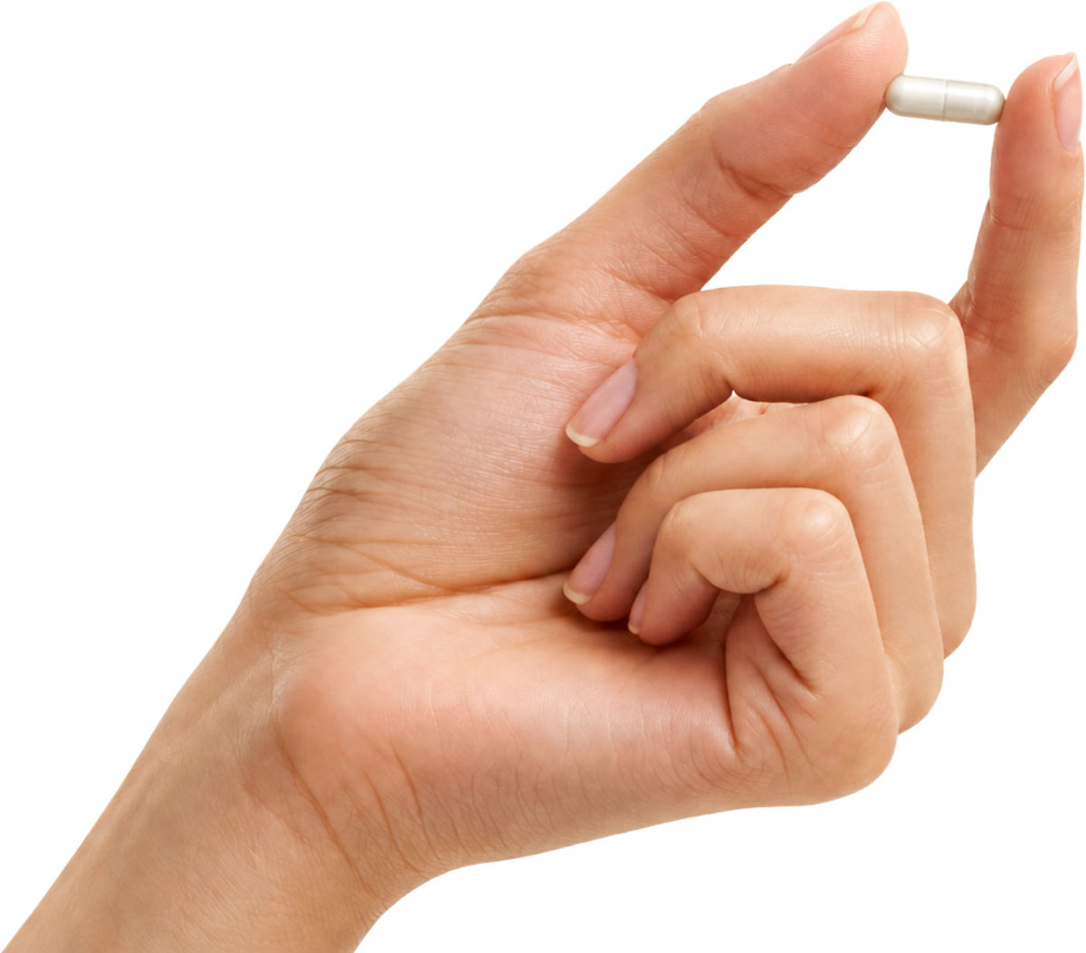 Hand hält eine kleine weiße RISE Micro-Kapsel zwischen Daumen und Zeigefinger